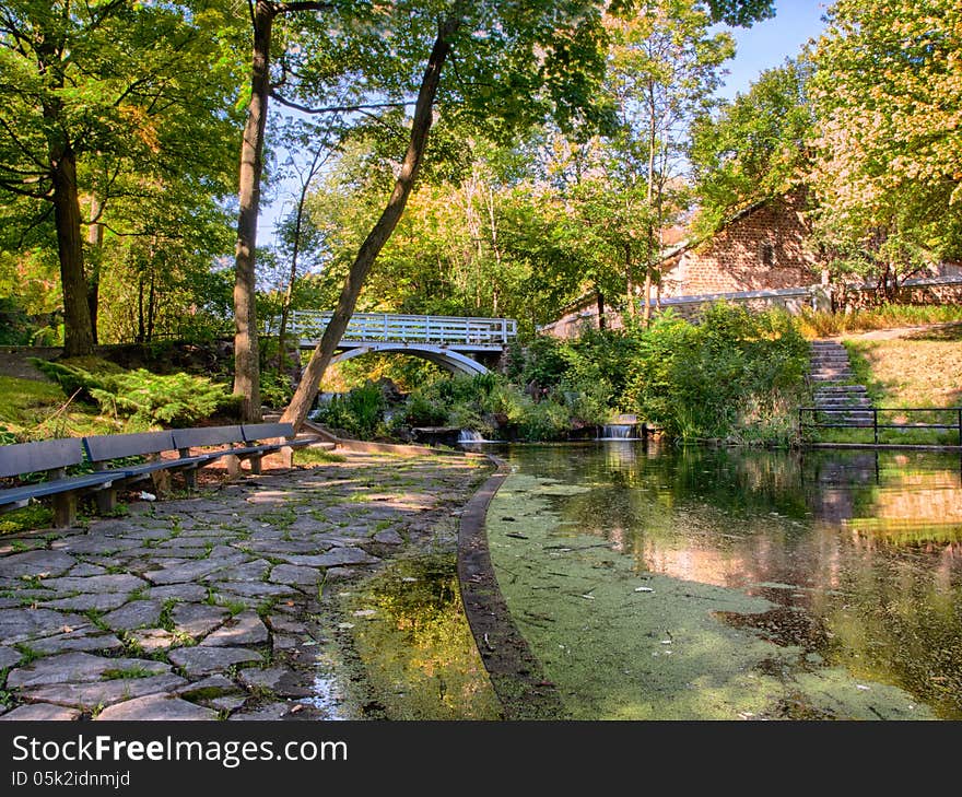 Little wooden bridge with railings in park Montreal Quebec Canada. Little wooden bridge with railings in park Montreal Quebec Canada.