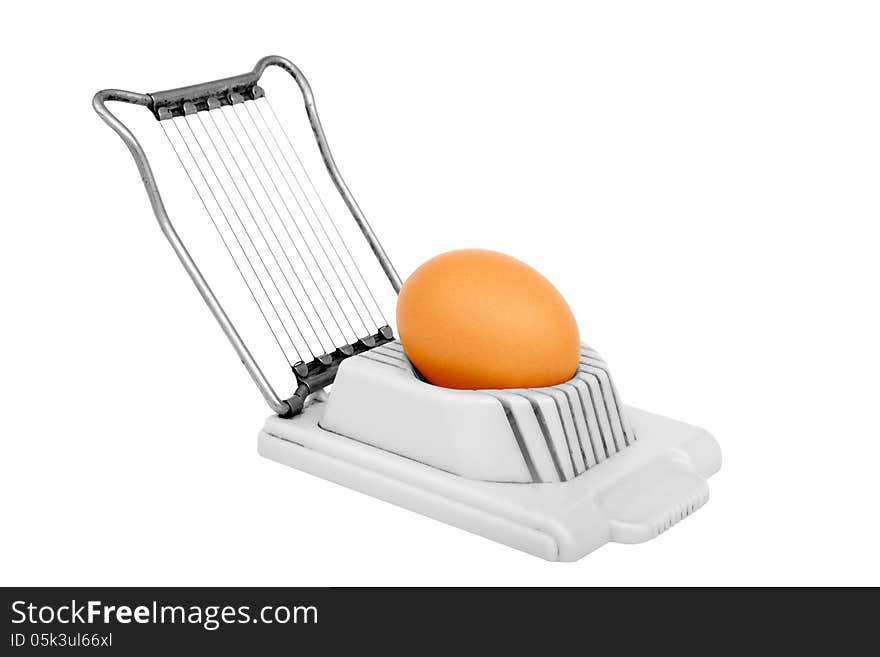 Old egg slicer isolated on a white background. Horizontal position.