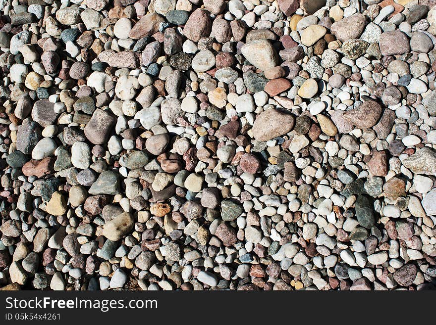 Many small stones as a texture and background