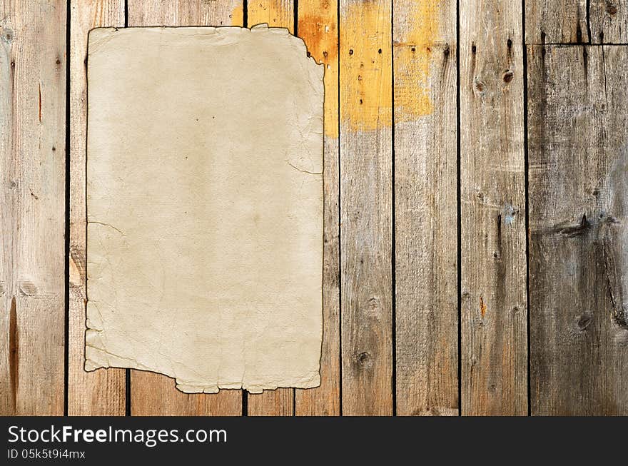 Old paper over an old wood background