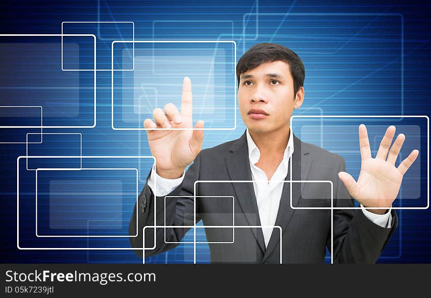 Asian Businessman With Touchscreen Interface