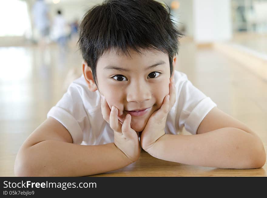 Happy young boy with smile on his face