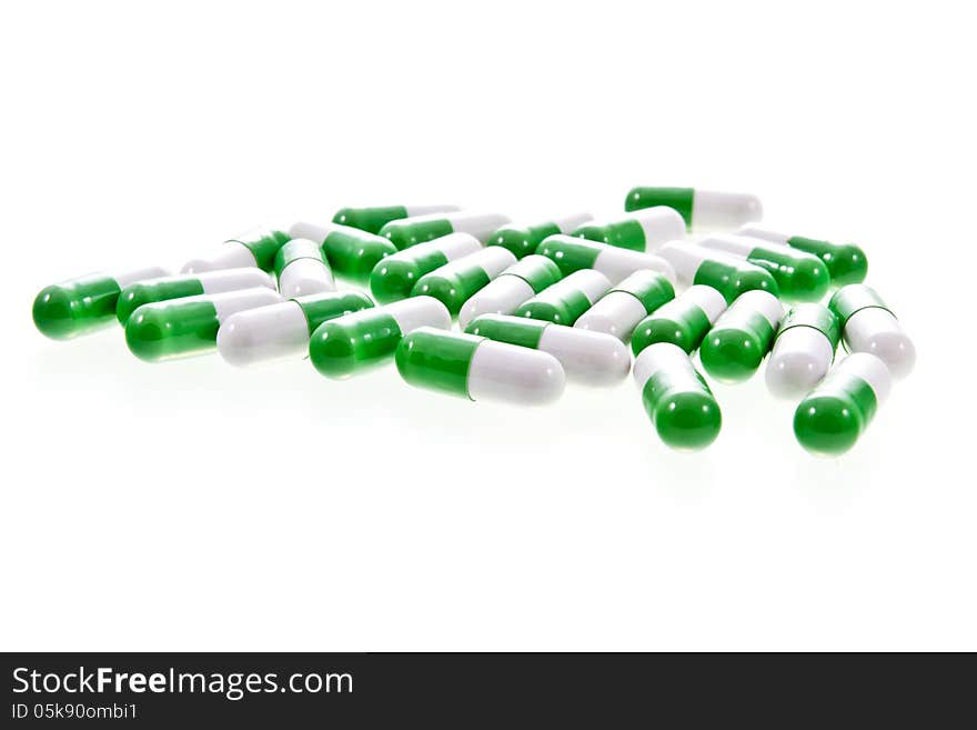 White and green capsule pills