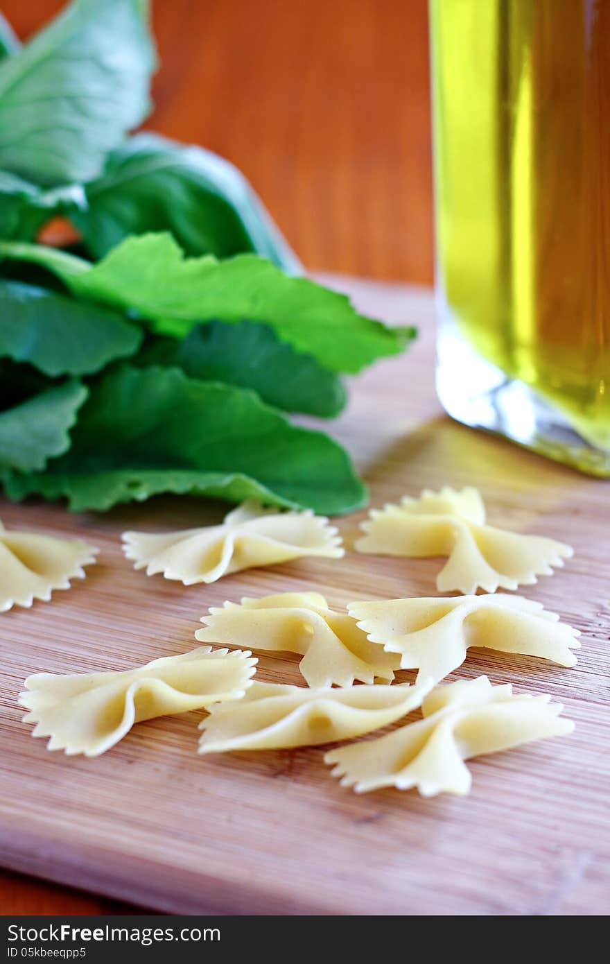 Bowtie pasta with greens and olive oil. Bowtie pasta with greens and olive oil.