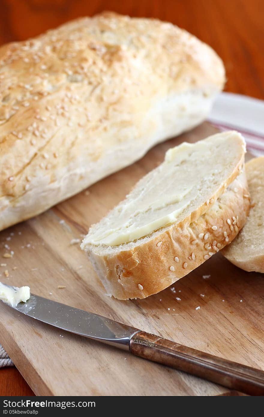 Slices of Italian bread with butter. Slices of Italian bread with butter.