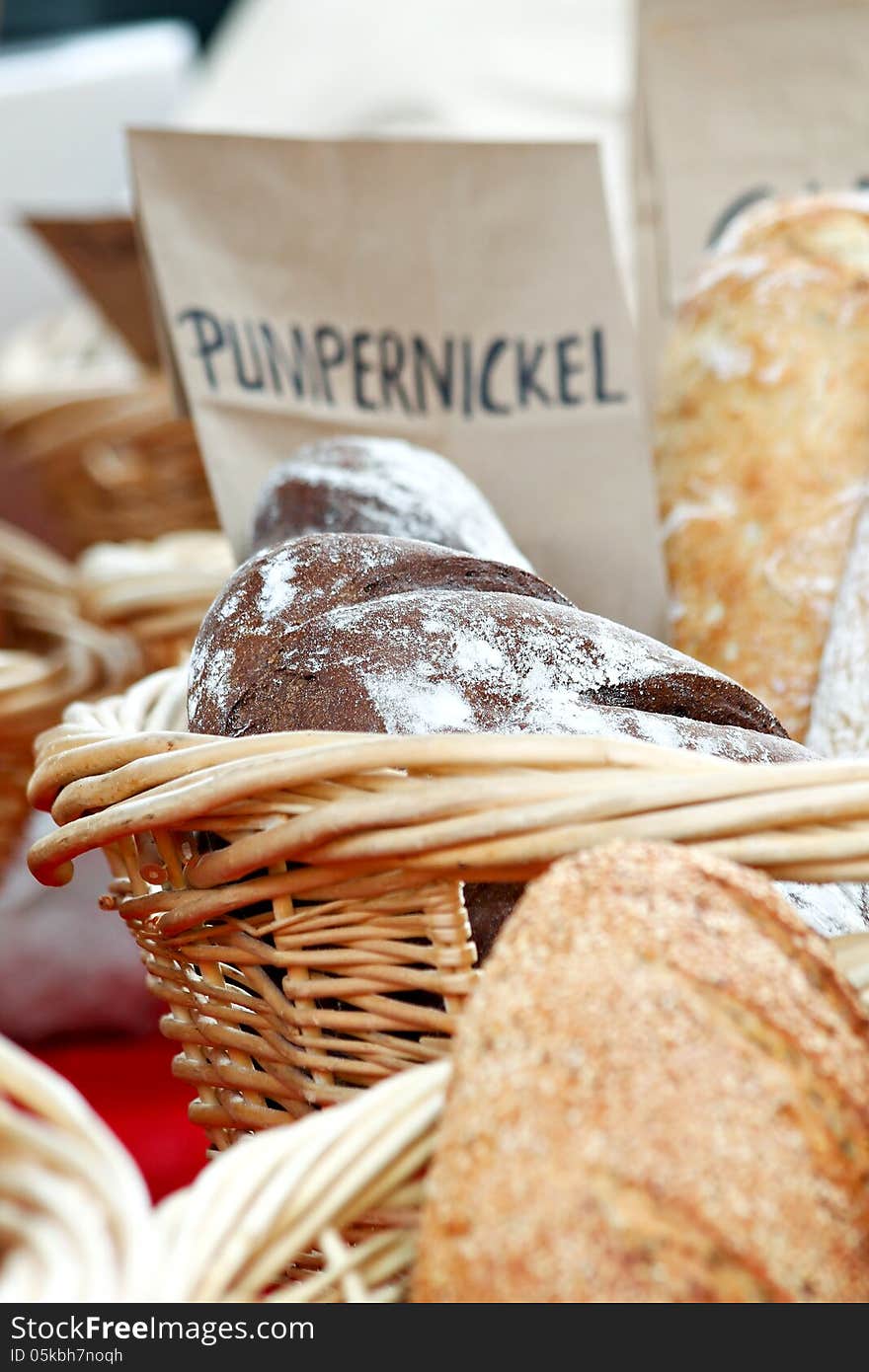 Baskets of bread at a farmers market. Baskets of bread at a farmers market.