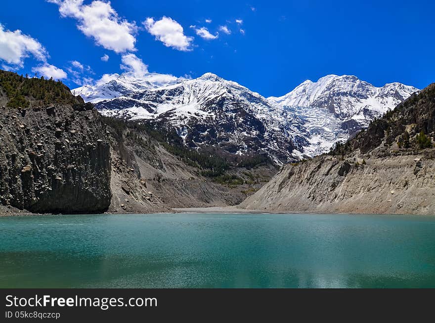 Himalayas mountain peaks and lake in Annapurna area - Gangapurna lake, Nepal. Himalayas mountain peaks and lake in Annapurna area - Gangapurna lake, Nepal