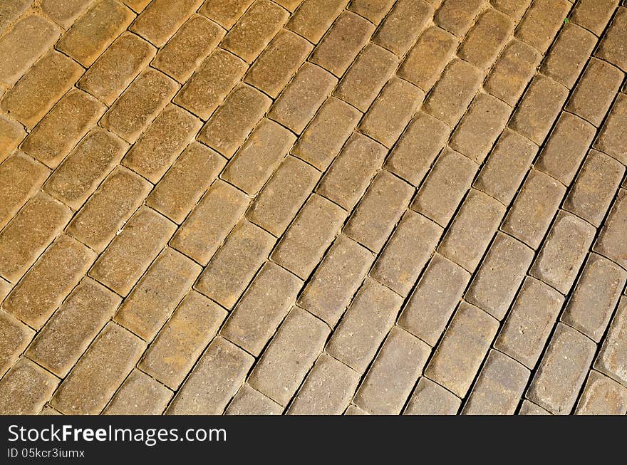 Diagonal pavement pattern made from yellow bricks