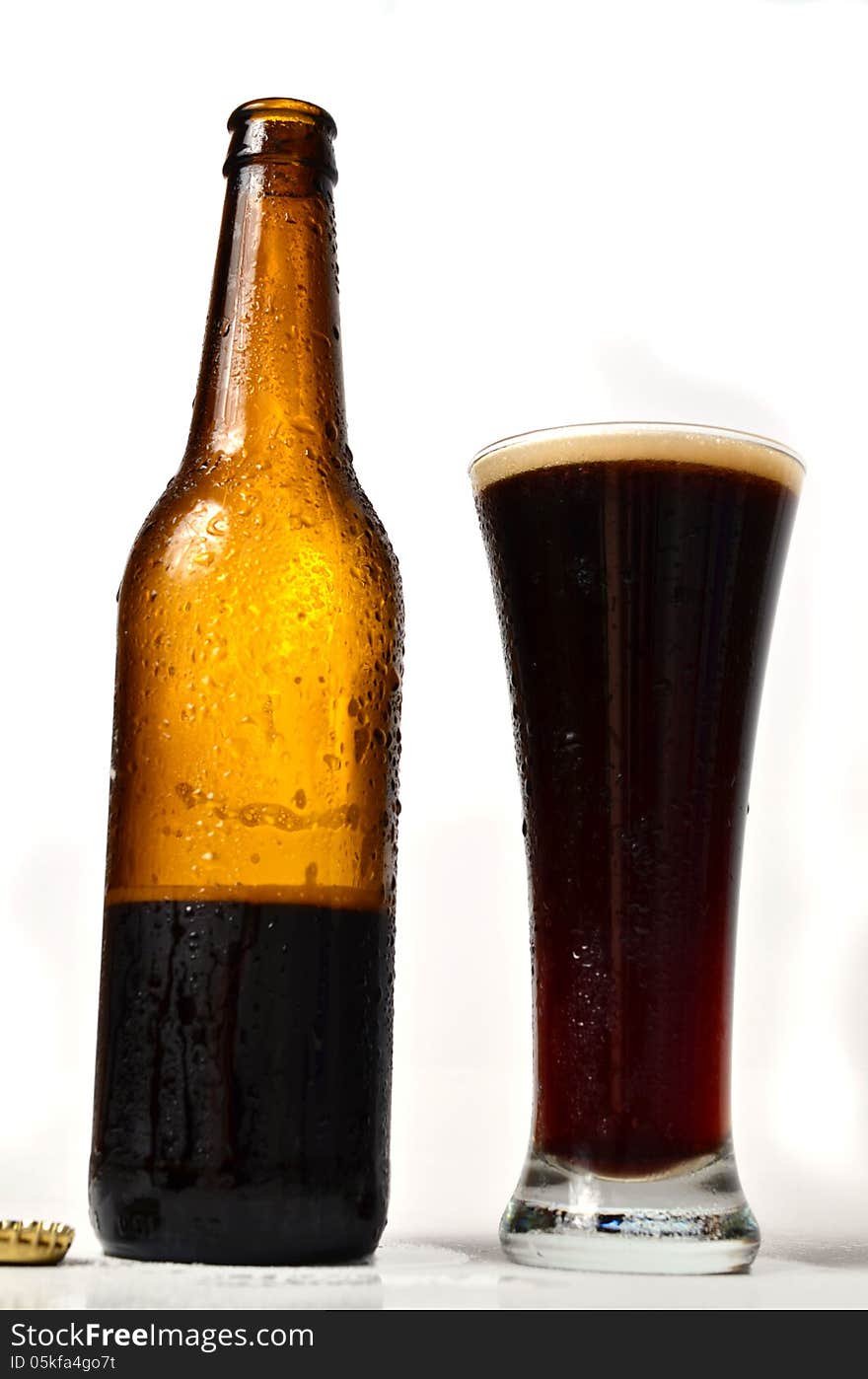 A bottle of beer on white background. A bottle of beer on white background