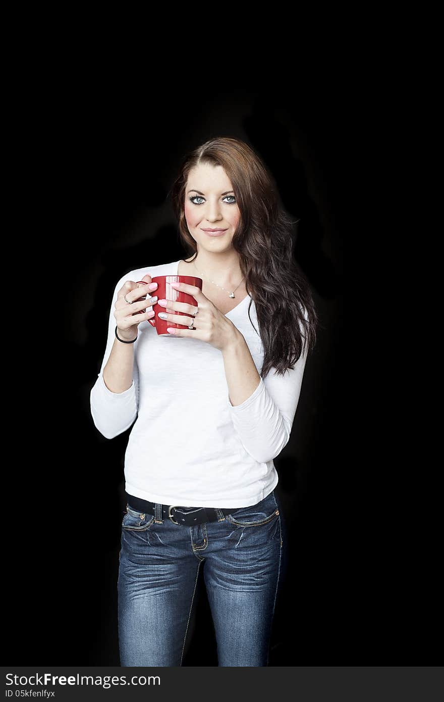 Young Woman with Beautiful Blue Eyes Drinking Coffee