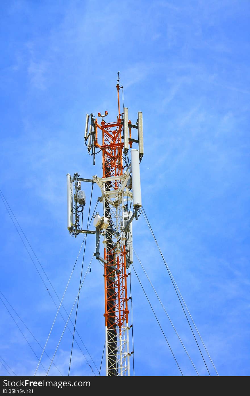 Telecommunication tower on blue sky