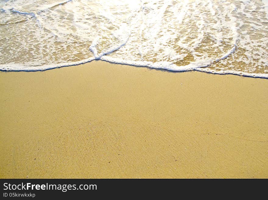 Waves crashing on the beach on a holiday resort. Waves crashing on the beach on a holiday resort