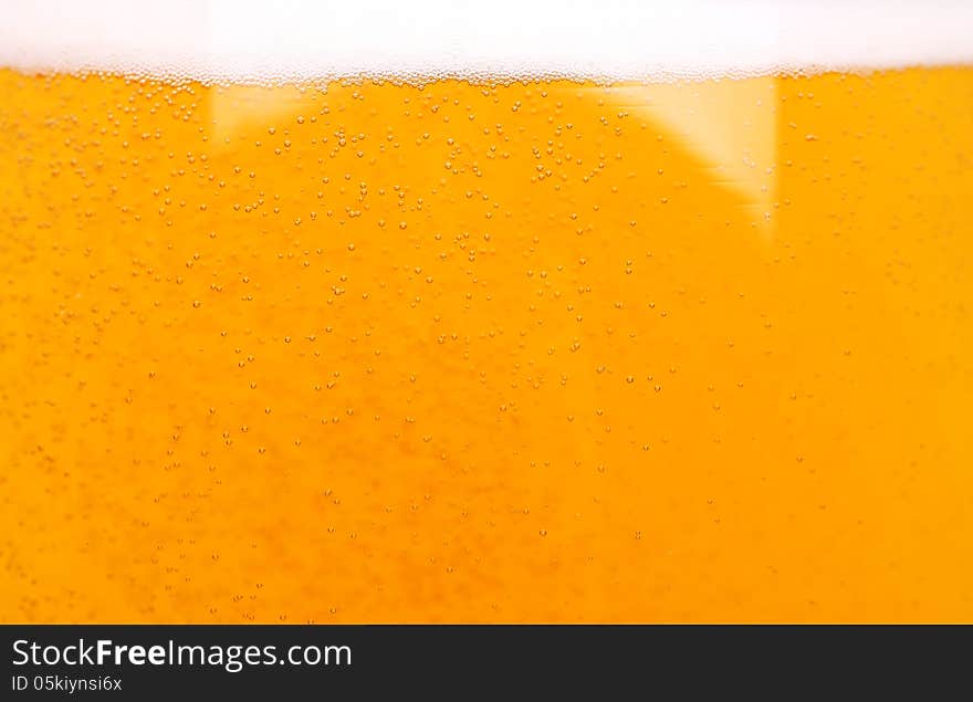 Light beer background. Close-up.