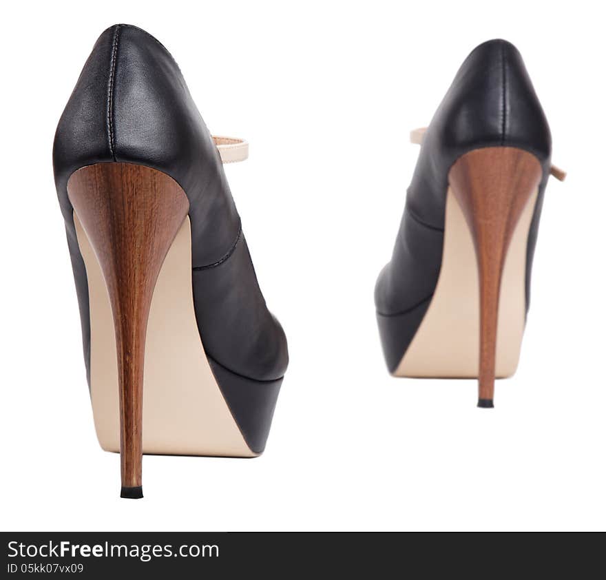 Dark female shoes isolated background