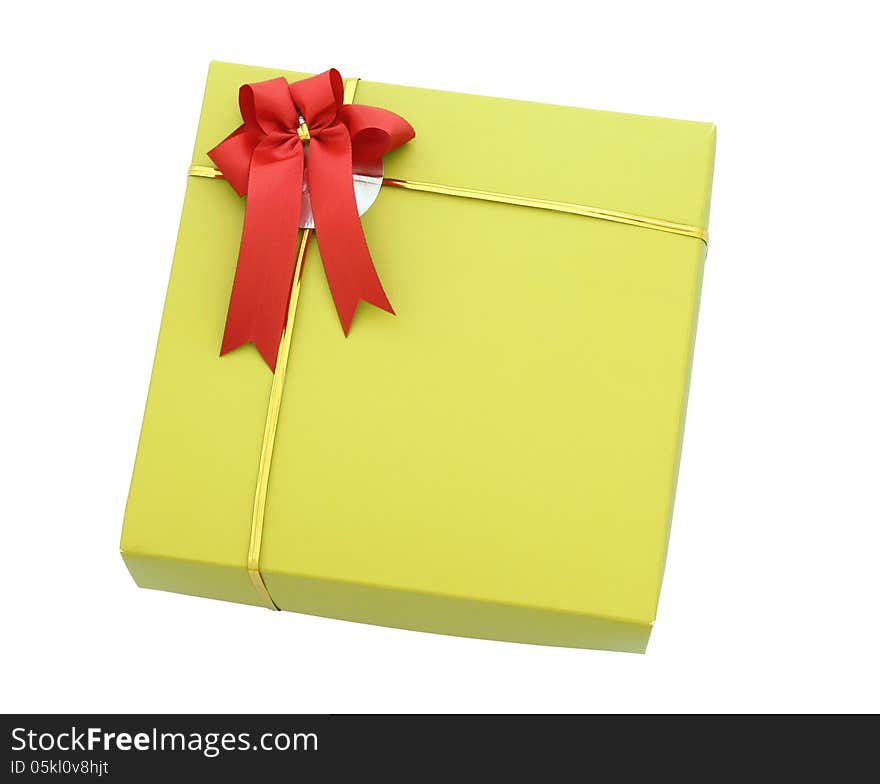 Gold gift box with red ribbon bow isolated on white with clipping path