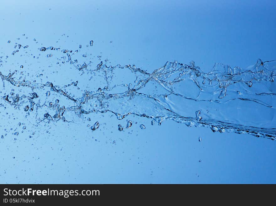 Feed and water drops isolated on a blue background. Feed and water drops isolated on a blue background.