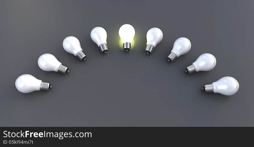 Light bulbs on the grey background with the middle one glowing (3d render)