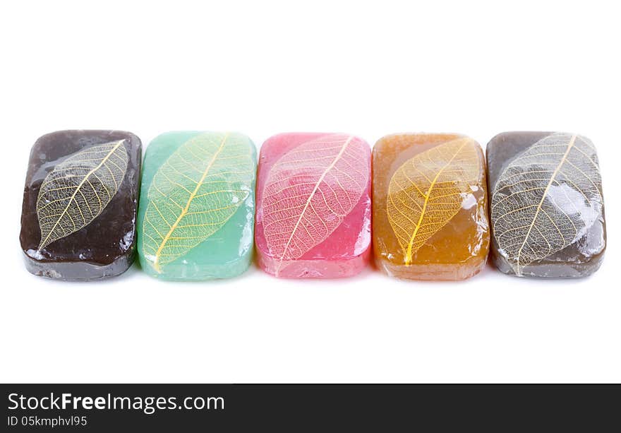 Colorful handmade soap on white background