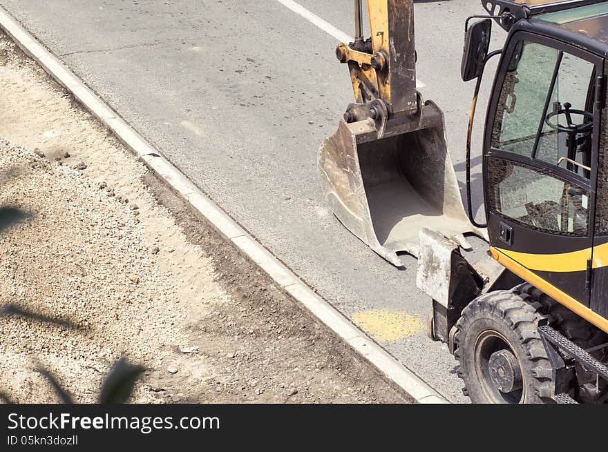 Scoop on a road construction site.