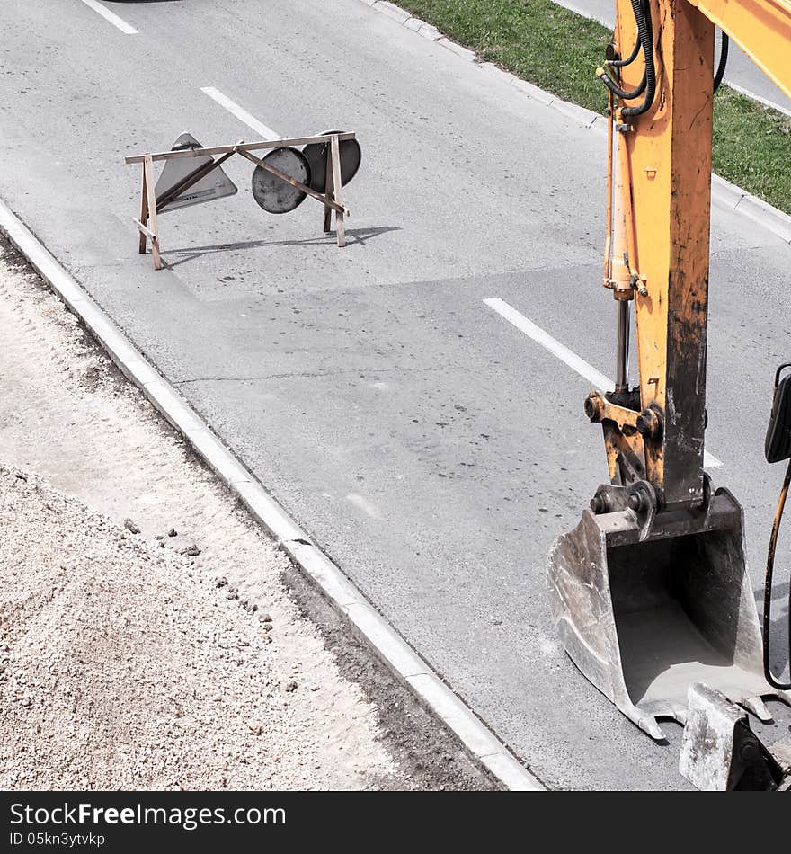 Scoop on a road construction site.