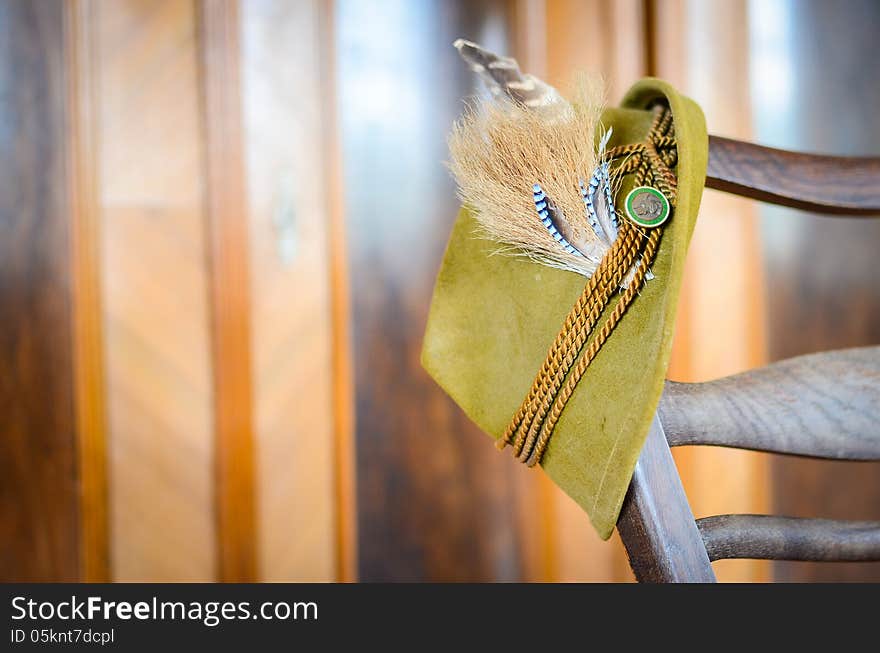 Old hunting hat standing on a chair