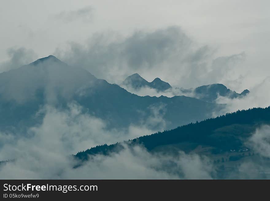 Mountains In Clouds