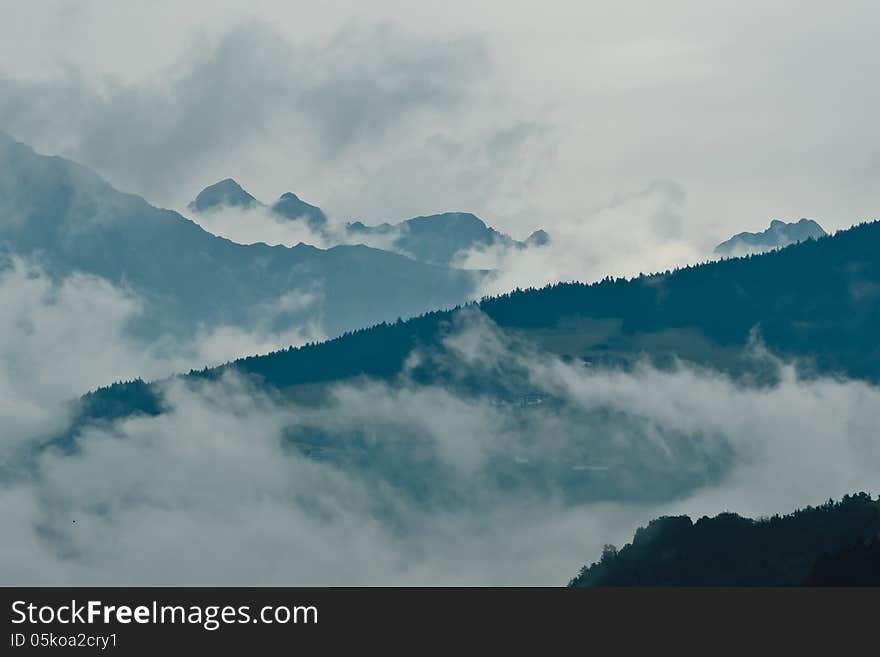 Mountains In Clouds