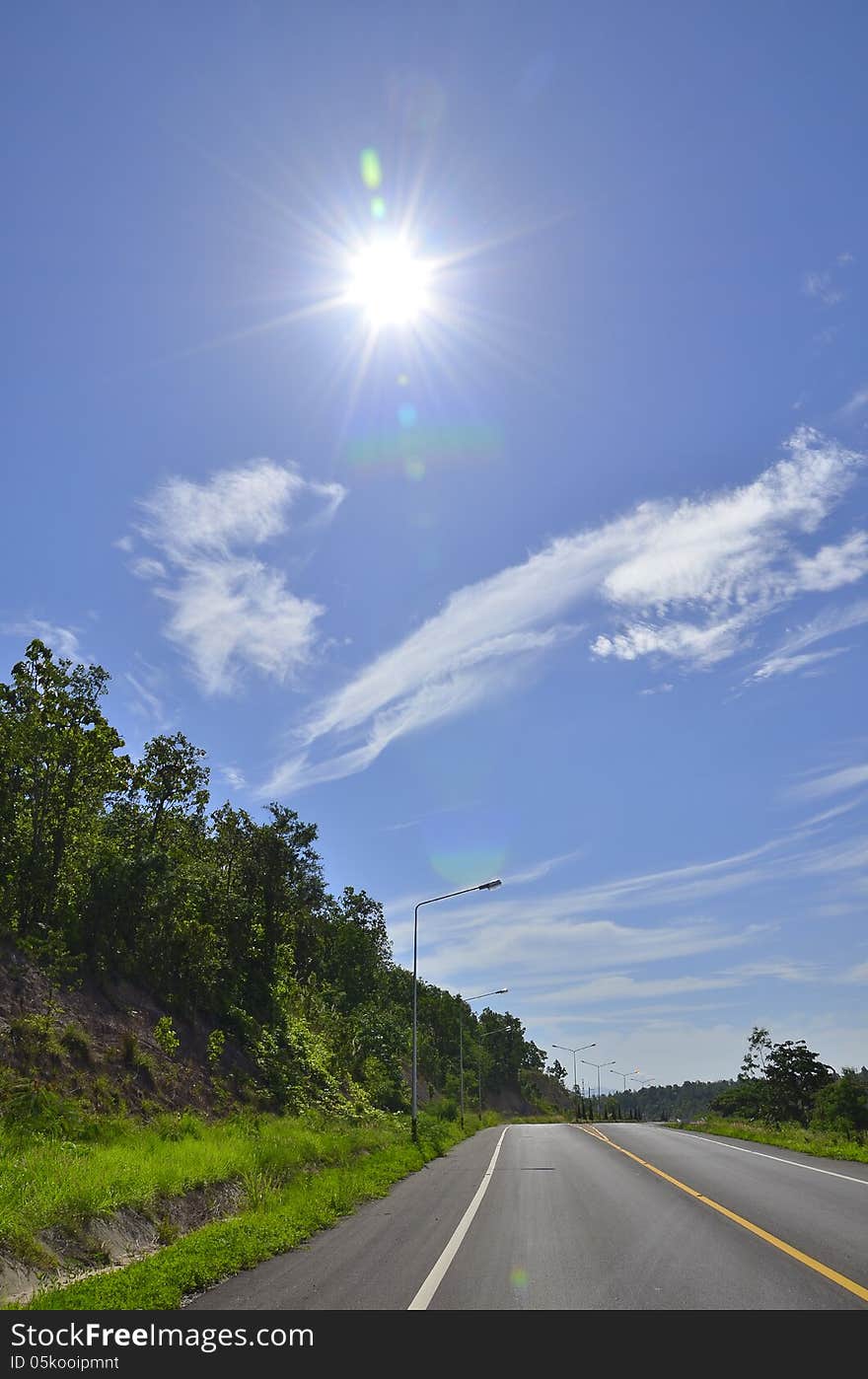 Hillside road and blue sky. Hillside road and blue sky.