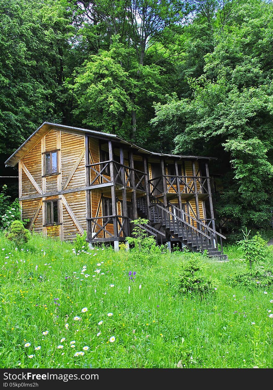 Wooden house in the forest ( can be a hotel)