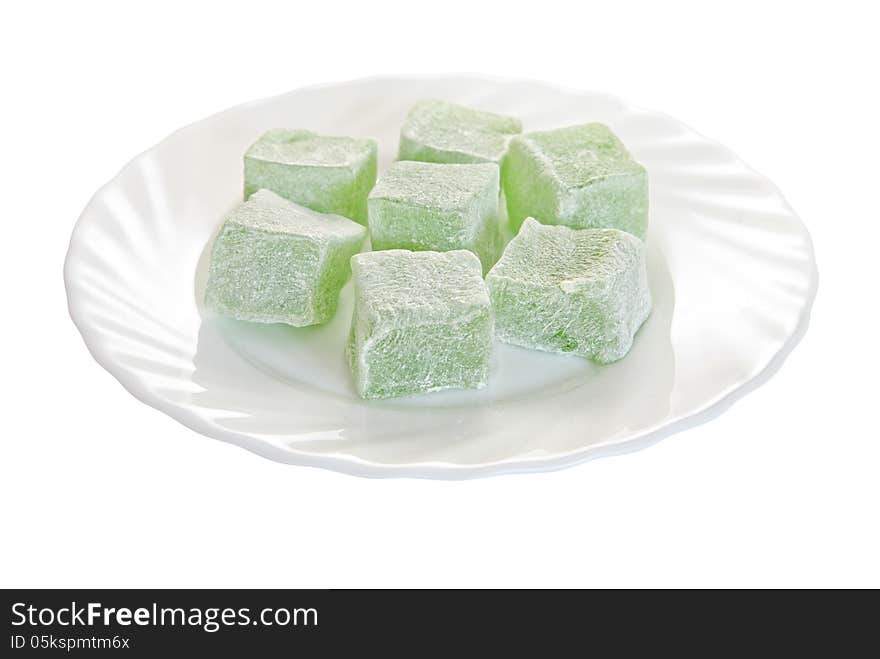 Turkish delight on a plate isolated