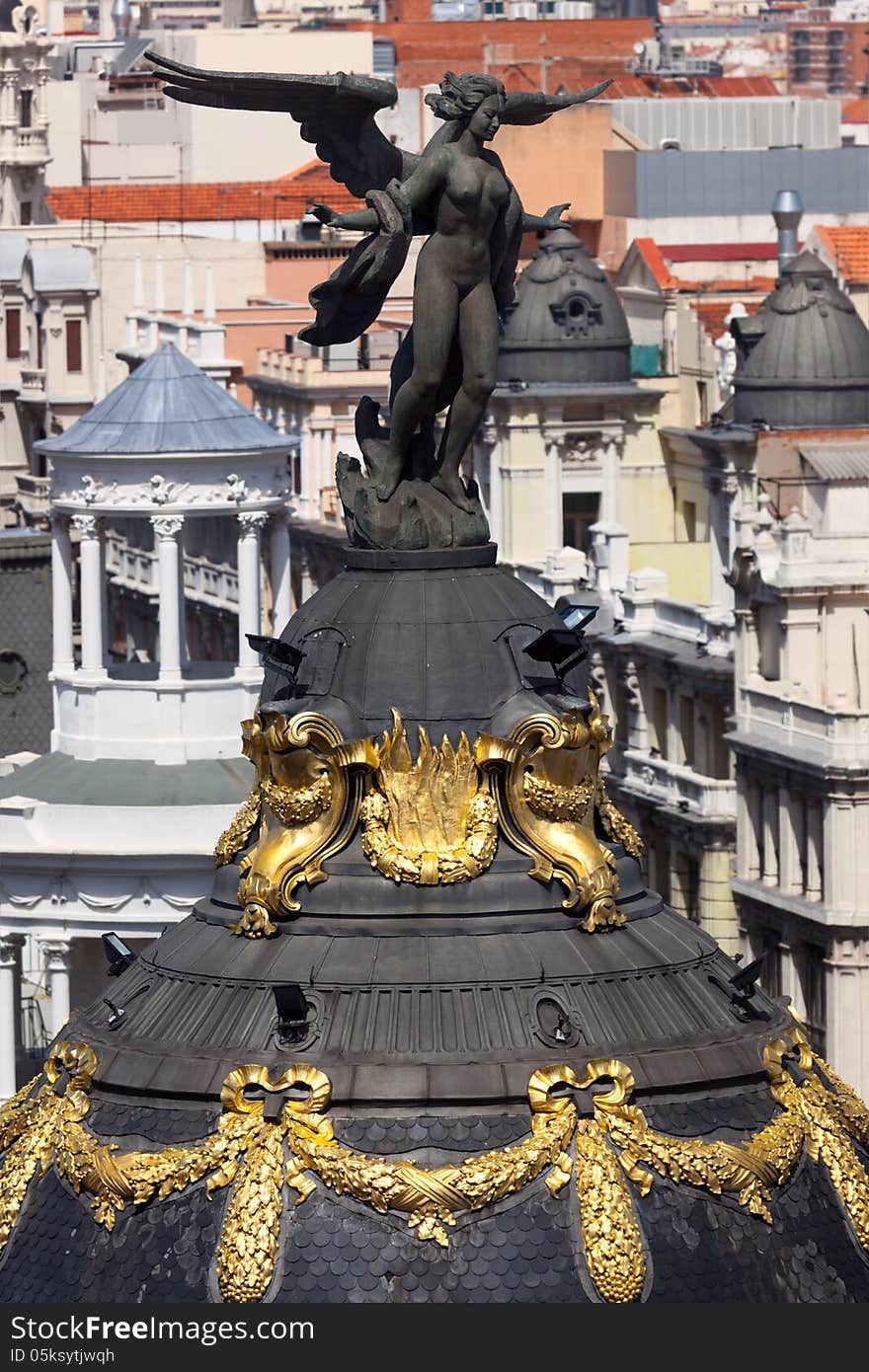 Aerial view of Madrid (Spain) / Famous sculpture and roofs of the city