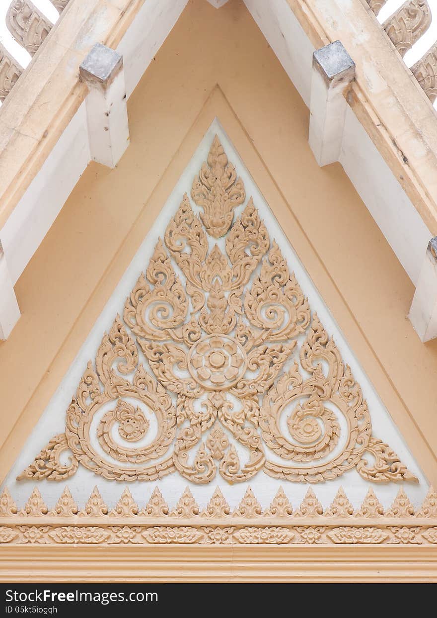 Golden thai texture in a triangular shape of temple. Golden thai texture in a triangular shape of temple