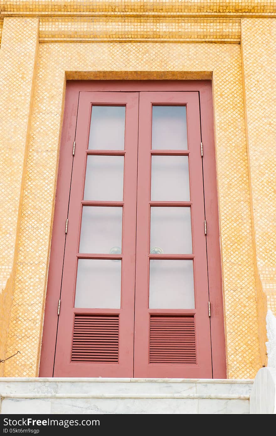 Red wood door style in temple of Thailand. Red wood door style in temple of Thailand