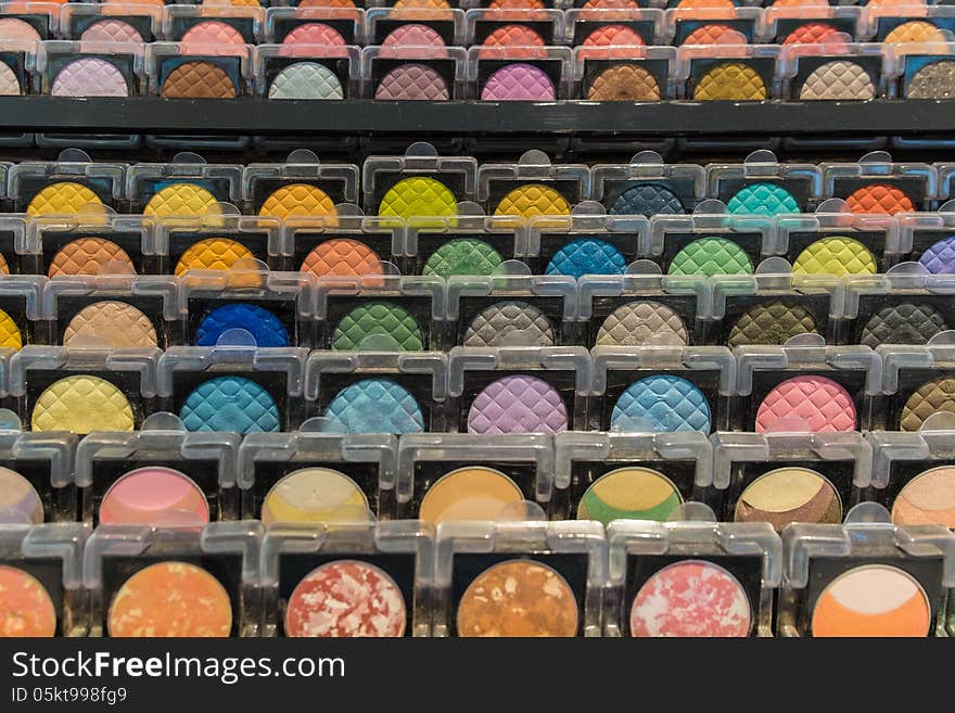 Various color of face make-up powder display in row