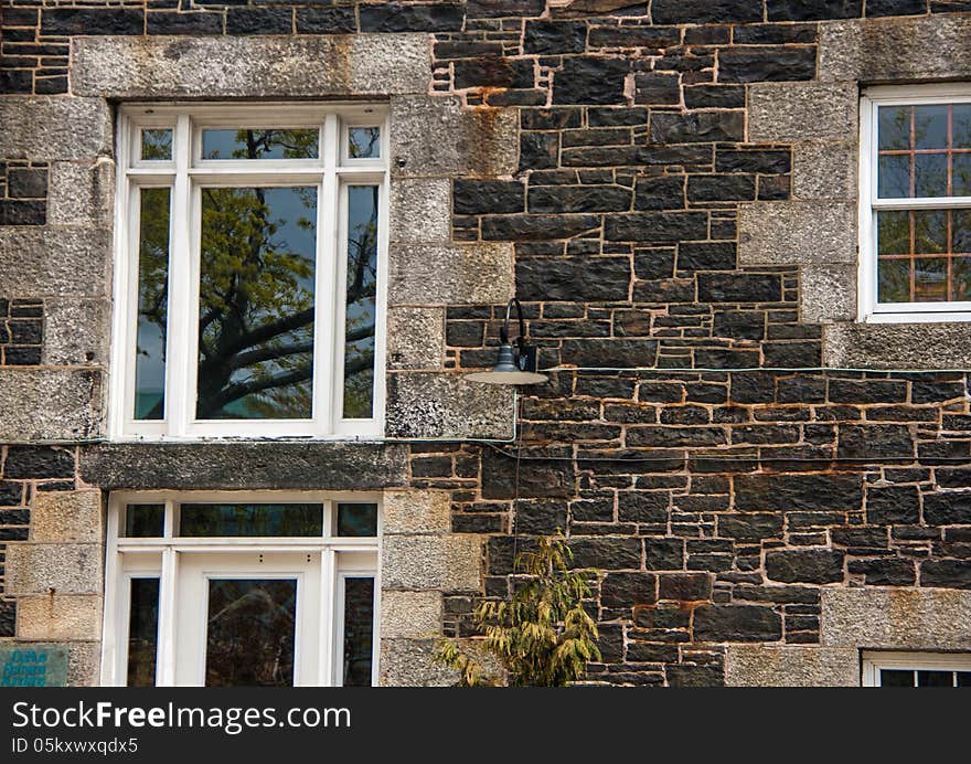 Old brick exterior wall and window in Halifax. Old brick exterior wall and window in Halifax