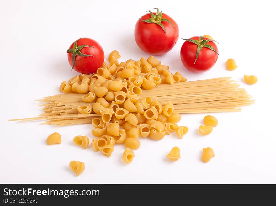 Raw pasta with cherry tomatoes. Raw pasta with cherry tomatoes