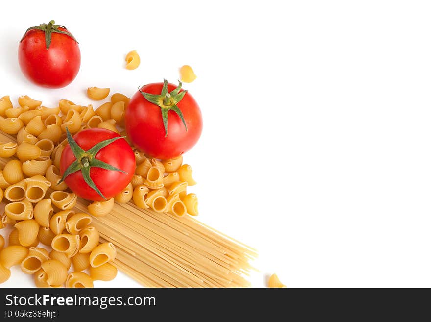 Raw pasta with cherry tomatoes with white space for your text here. Raw pasta with cherry tomatoes with white space for your text here