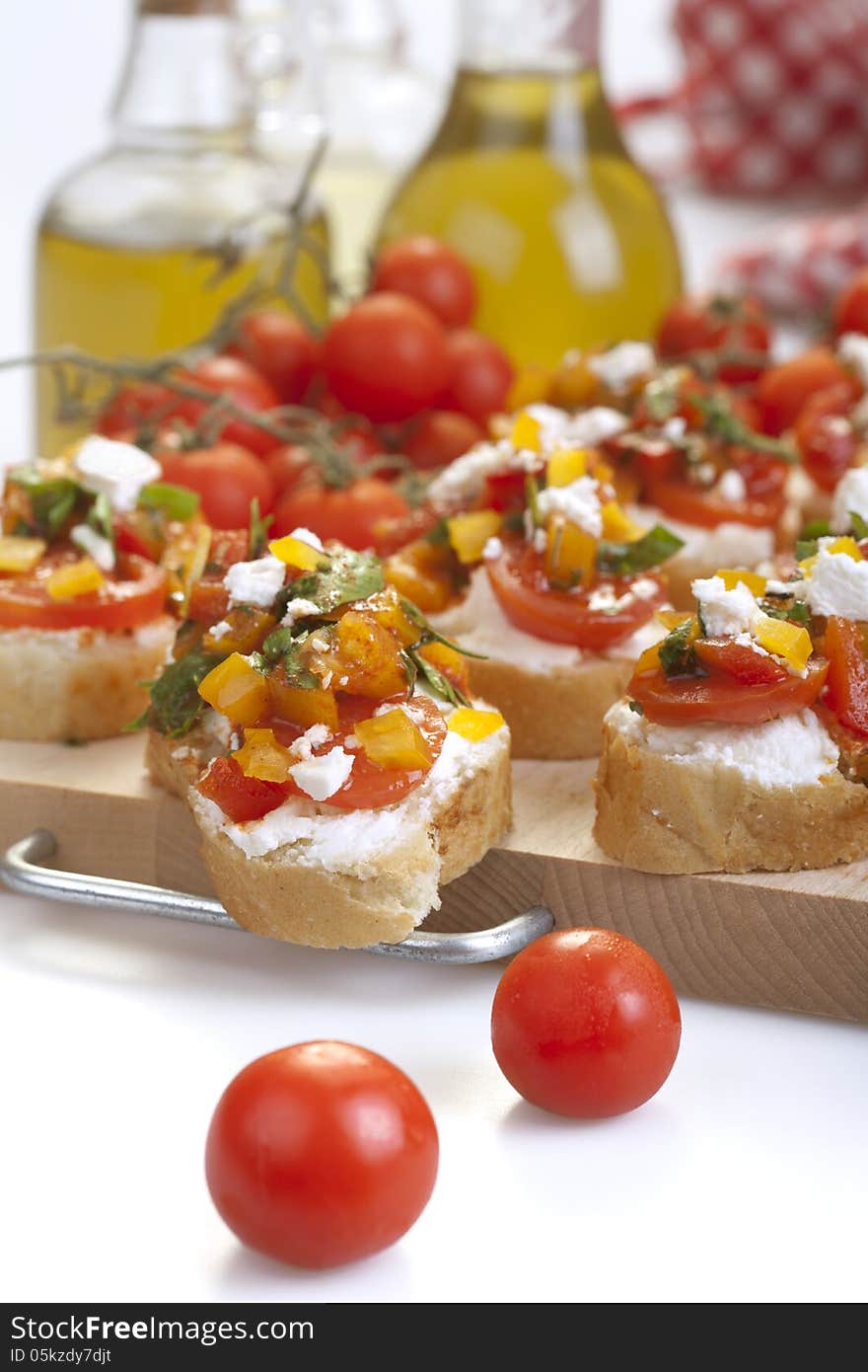 Appetizer called Bruschetta with oil and tomato