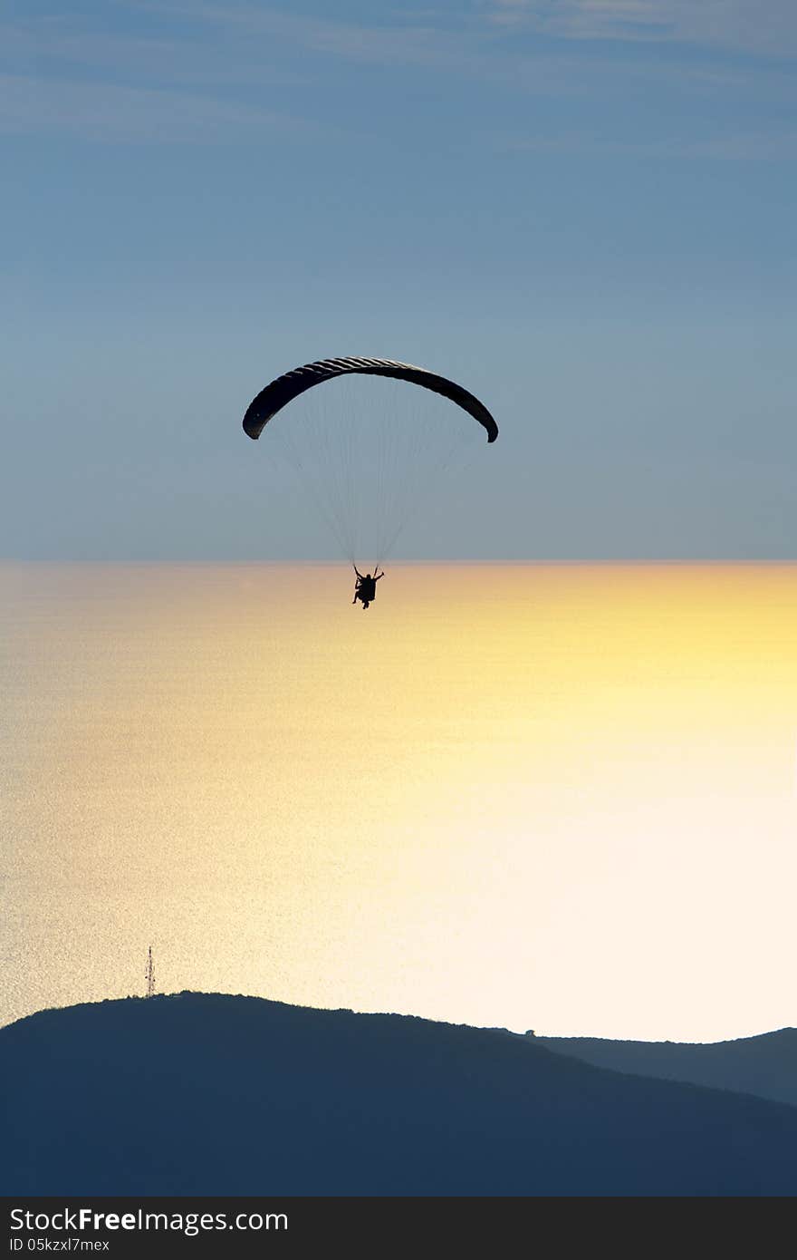 Paraglider in the evening sky, Budva Montenegro. Paraglider in the evening sky, Budva Montenegro