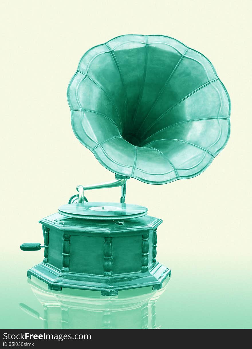 Vintage Gramophone with disc isolated on grunge background