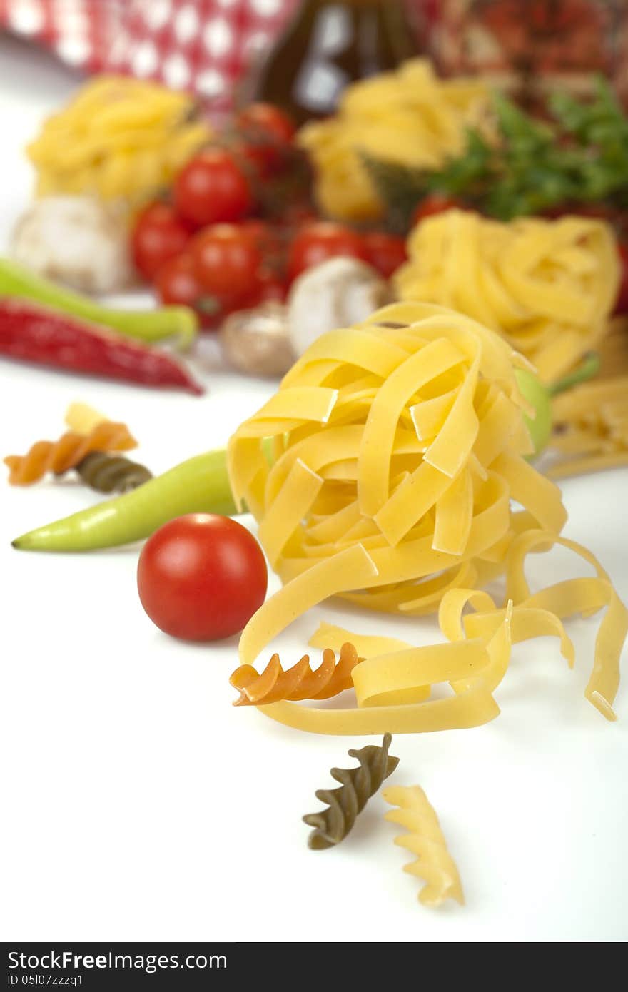 Tomato, macaroni, tagliatelle and pepper. Tomato, macaroni, tagliatelle and pepper