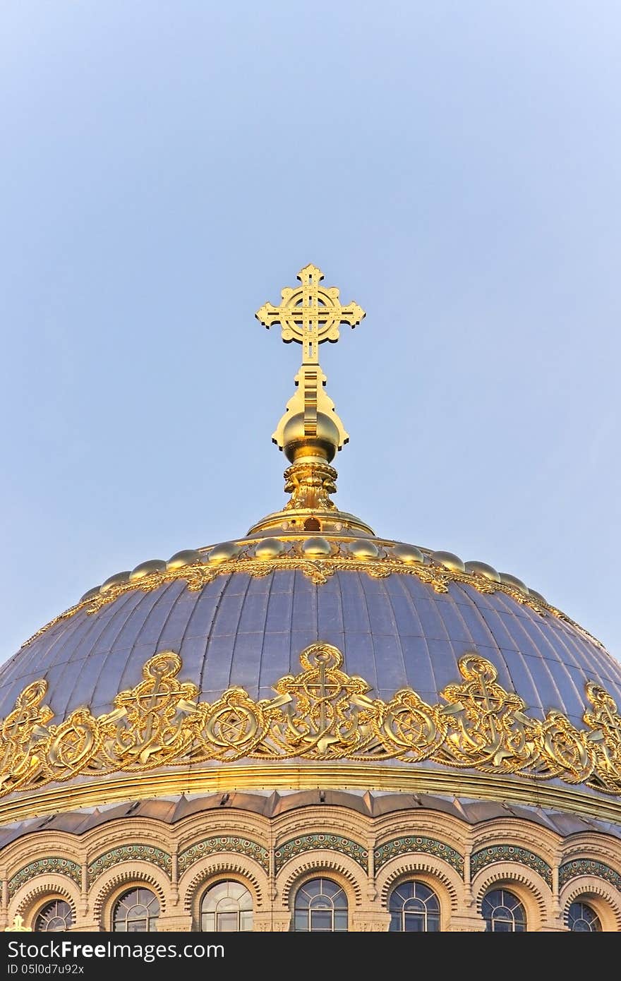 The main dome with a cross naval Cathedral in Kronstadt, Saint-Petersburg, Russia