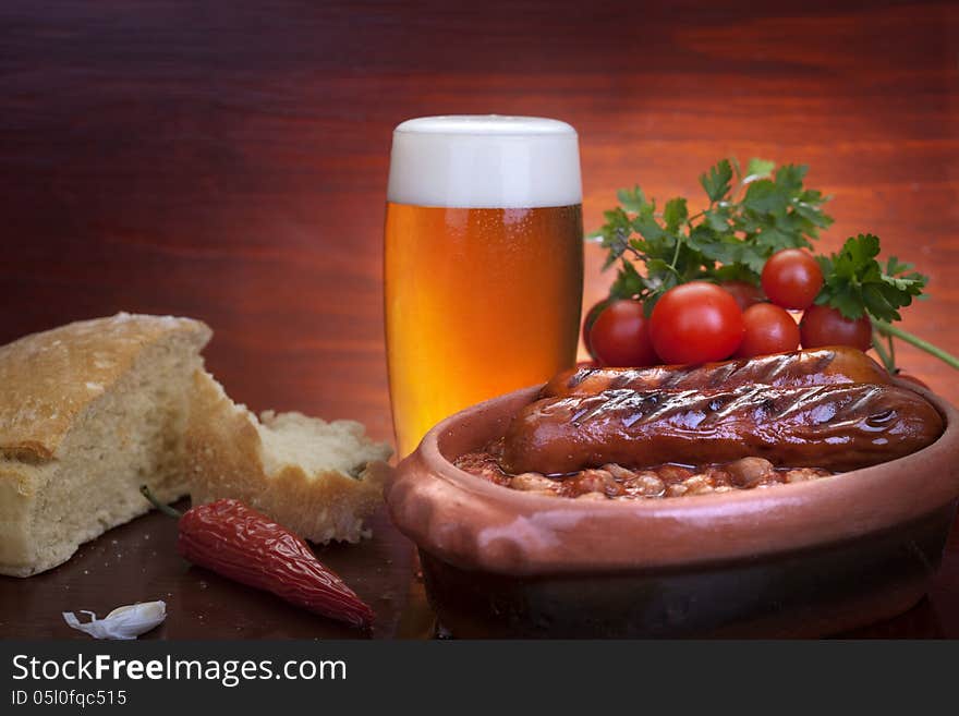 Baked beans, sausage and beer. Baked beans, sausage and beer