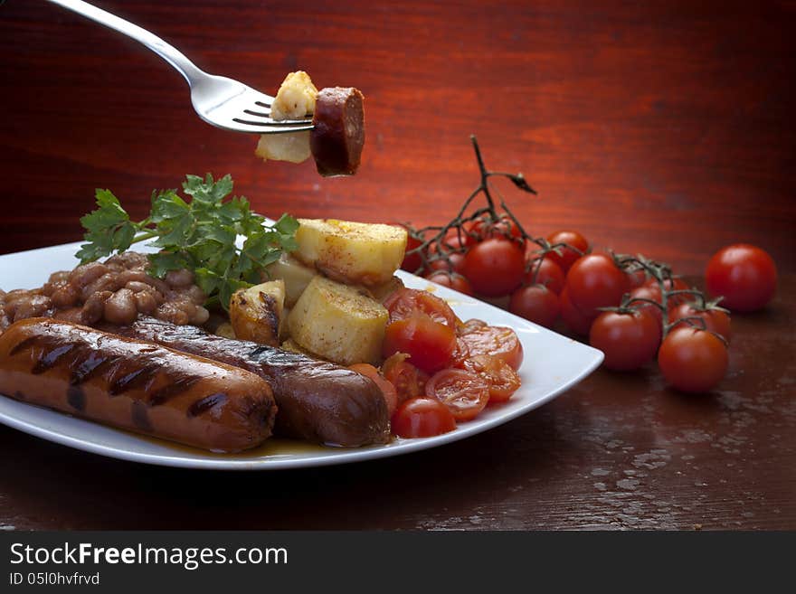 Baked beans, sausage and potato. Baked beans, sausage and potato