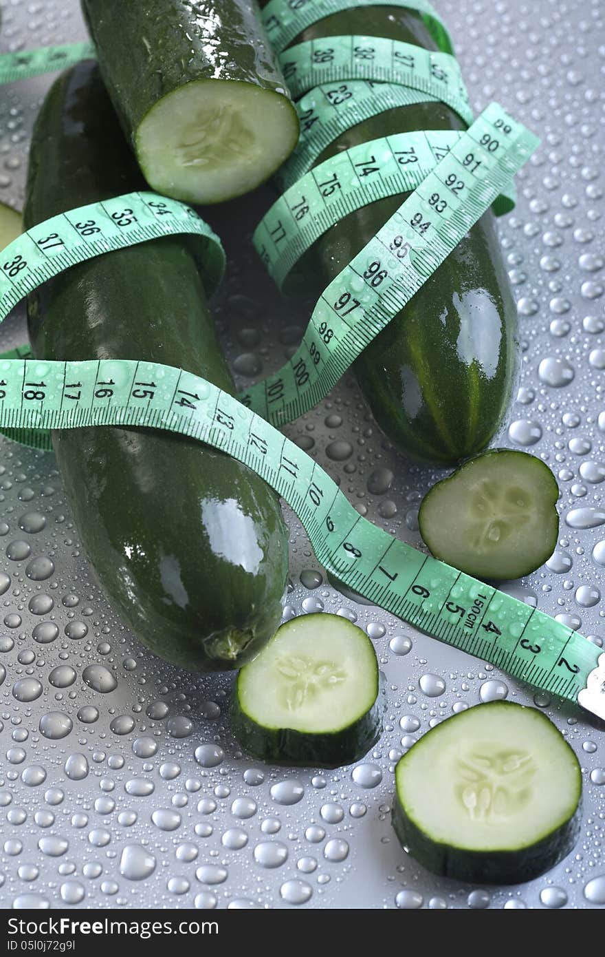 Organic cucumber with tape measure. Organic cucumber with tape measure