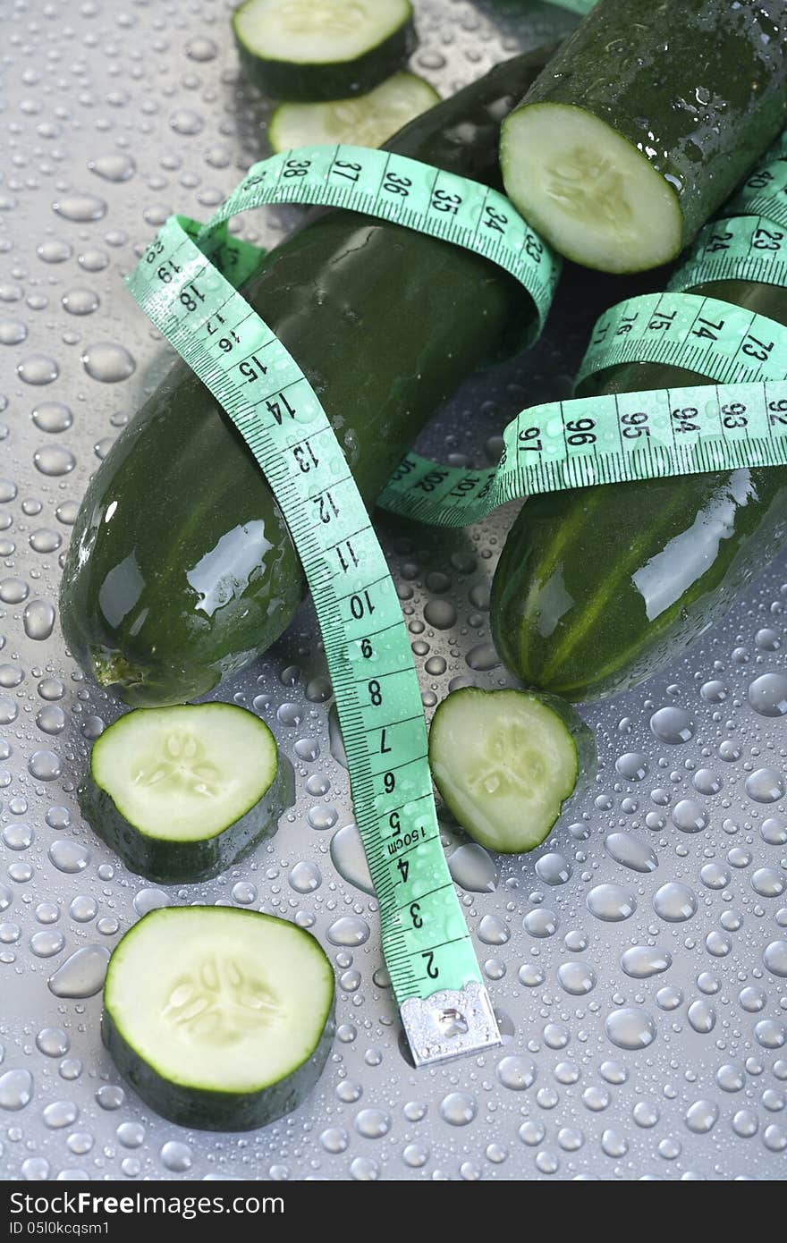 Organic cucumber with tape measure. Organic cucumber with tape measure