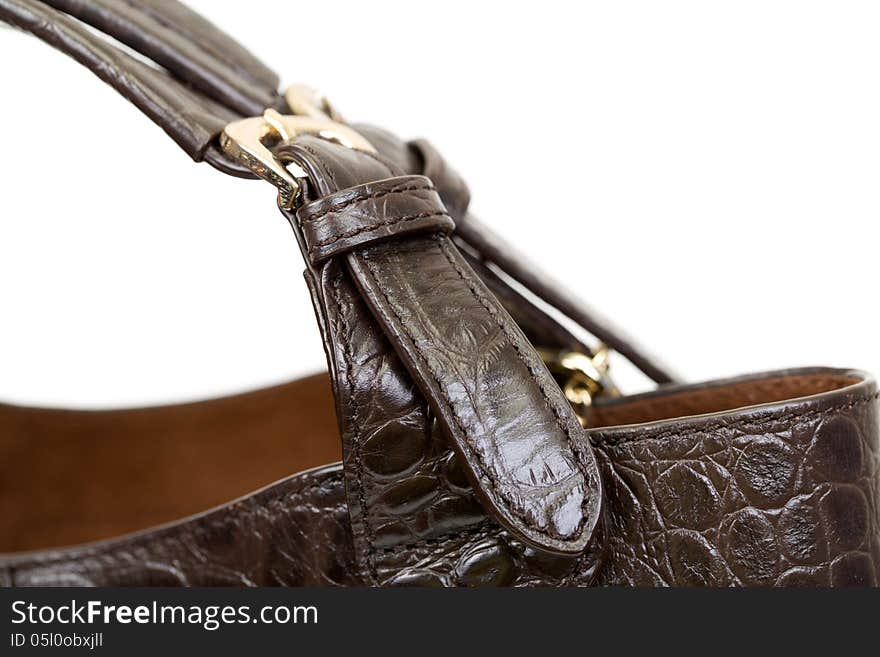 Close-up brown fashion ladies handbag crocodile