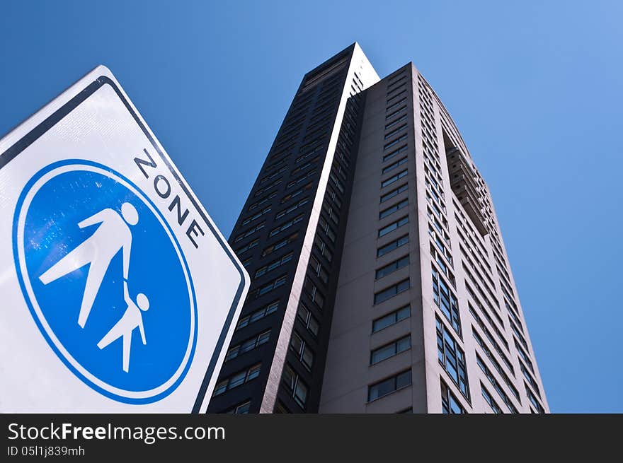 Apartment building and traffic sign. Apartment building and traffic sign.