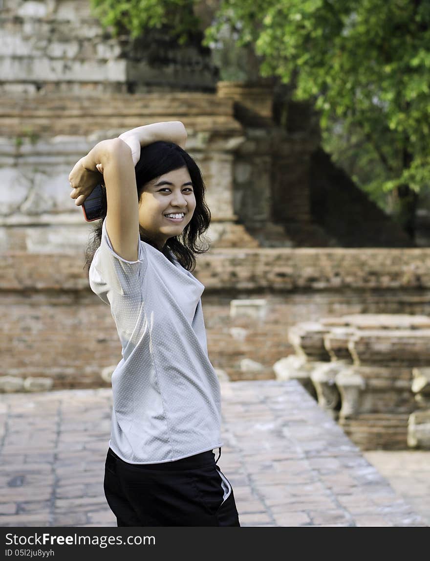 Asian woman at Wat Maheyong Temple. Ayutthaya province - Thailan