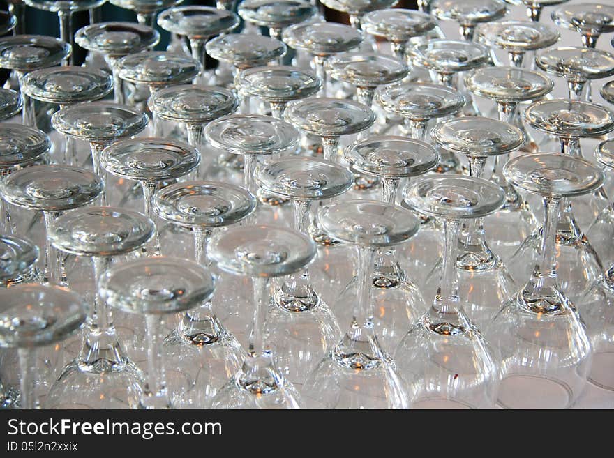 Rows of Empty Wine Glasses on the table ready for guests